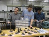 Two computer scientists build motes in the lab